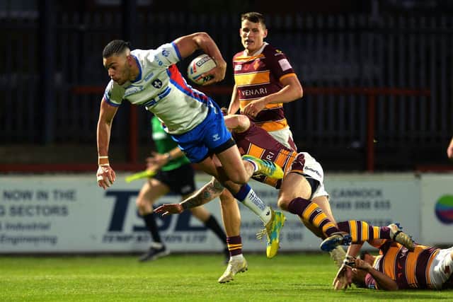 Lewis Murphy's try after the half-time hooter helped Trinity into a 12-4 lead. Picture by Jonathan Gawthorpe.