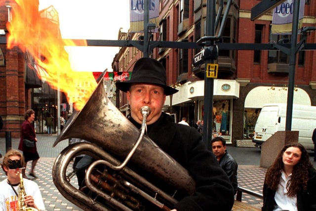 Musician Sam Paechter set fire to his tuba in Lands Lane to launch Music, Fire and Masks, a  30-day street entertainment festival in the cty centre to coincide with Euro 1996.