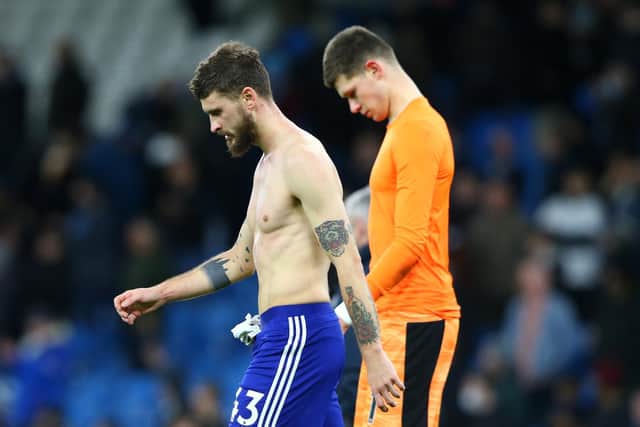 Mateusz Klich and Illan Meslier look dejected after Leeds United's drubbing to Manchester City in December 2021. Pic: Alex Livesey.