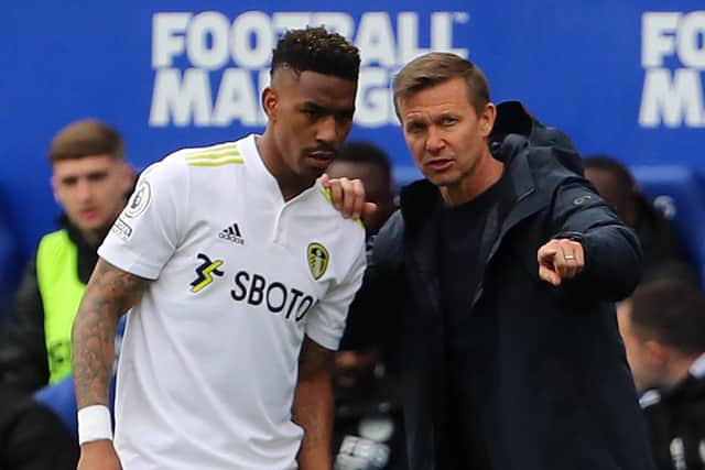 LECTURE: Leeds United defender Junior Firpo [left] was signed shortly after the transfer window opened last summer (Photo: GEOFF CADDICK/AFP via Getty Images)