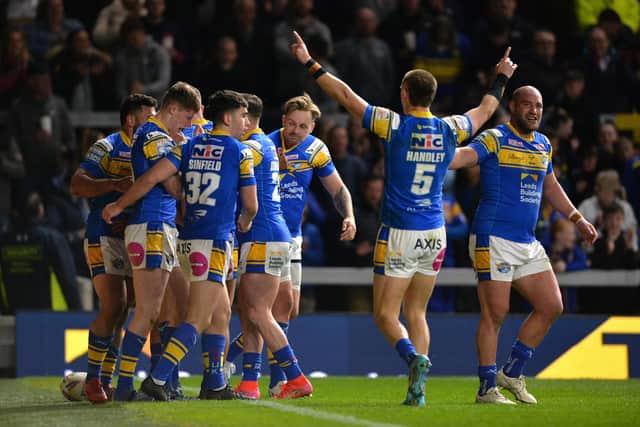 Gannon Ball: Young forward Morgan Gannon is congratulated after scoring Leeds Rhinos’ second try in the 12-0 Betfred Super League win over Hull KR last night. Picture: Bruce Rollinson
