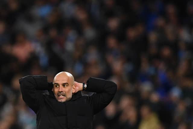DOUBLE SETBACK: For Manchester City boss Pep Guardiola, above, for Saturday evening's clash against Leeds United at Elland Road.
Photo by OLI SCARFF/AFP via Getty Images.