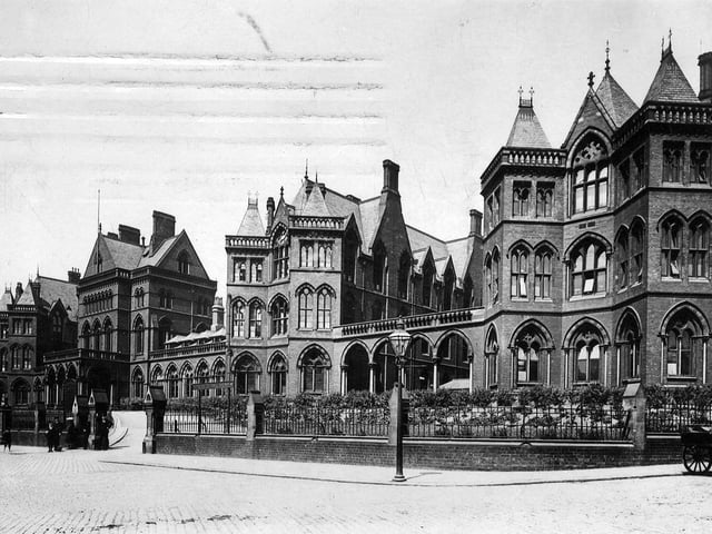 A postcard of Leeds General Infirmary with a postdate of Christmas Eve 1909. This shows the original buildings on Great George Street, seen from the junction with St. James' Street.