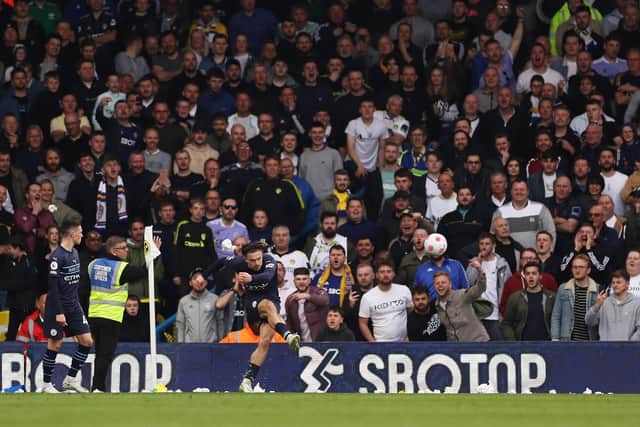 TAKING PELTERS - Jack Grealish was pelted with the paper left over from Leeds United's East Stand tifo during Manchester City's 4-0 Elland Road win. Pic: Getty