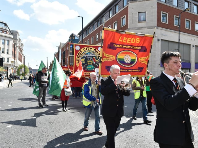 Many held banners as the procession headed through the city