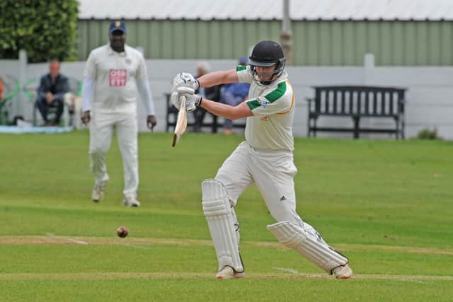 Mark Robertshaw in Priestley Cup action for Pudsey St Lawrence against hosts, Ossett. Picture: Steve Riding.