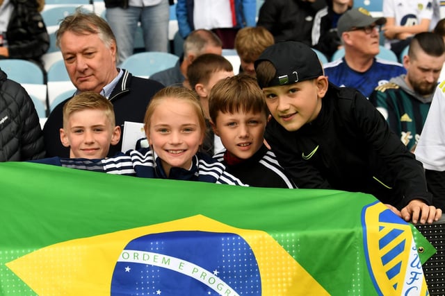 Leeds United and Brazil as one as these young Whites fans show their support for Selecao star Raphinha.