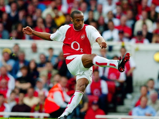 Thierry Henry shoots at goal.