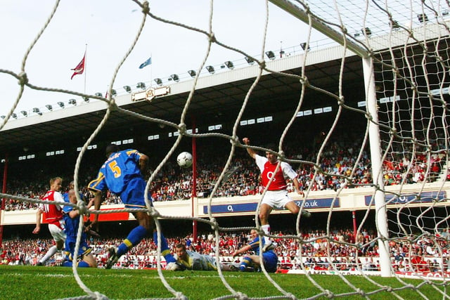 Dennis Bergkamp scores Arsenal's second goal.