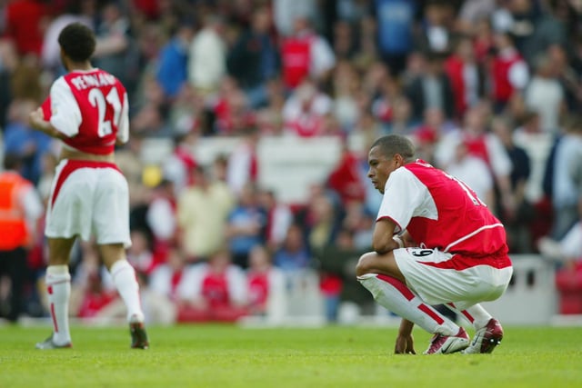 Arsenal's Gilberto looks dejected at full-time.