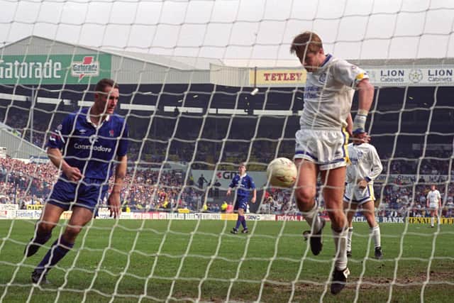 CHAMPIONS-ELECT: Lee Chapman, right, bagged Leeds United's second goal as part of a 3-0 win against a Chelsea side featuring former Whites favourite Vinnie Jones, left, to put the Whites back in pole position back in April 1992. Picture by Varleys.
