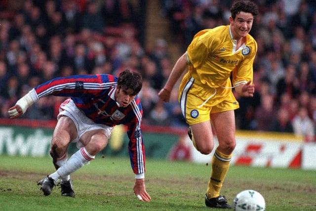 Lee Matthews slips the attentions of Crystal Palace's David Woozley.