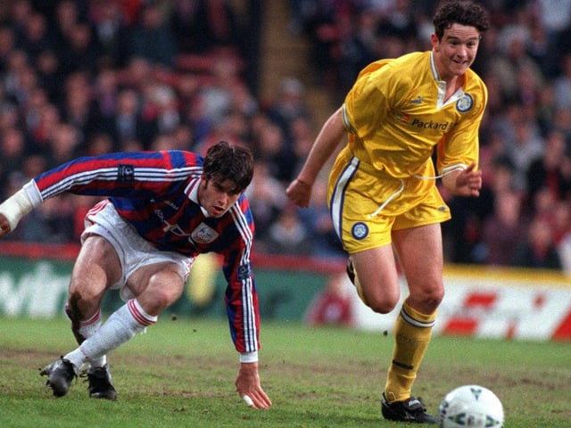 Lee Matthews slips the attentions of Crystal Palace's David Woozley.