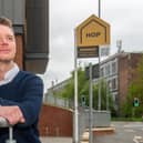 Luke Gidney, managing director at Leeds estate agent HOP, pictured with one of the golden boards. Picture: James Hardisty