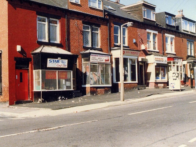 A row of shops and houses on Tempest Road between the junctions with Maud Avenue, left, and Stratford Street. The first shop on the left, Star Sweet Centre, was previously Heslington's baker. Next to this is the Fashion Cloth Store, then Dana Properties and a newsagents.