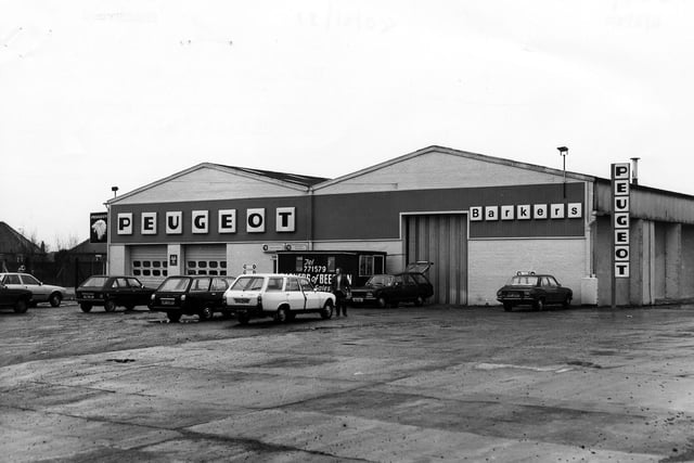 Barker's garage and car showroom, a Peugeot dealer, on Old Lane pictured in February 1980.