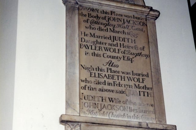 A memorial plaque in St. Mary's Church to John Jackson of Cottingley Hall. The inscription reads: 'Near this Place was buried the Body of John Jackson of Cottingley Hall, Gent, who died March 1695.