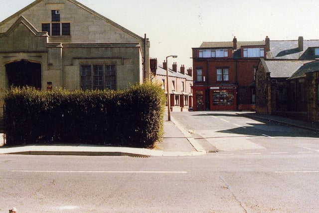 The Church Hall of the Church of the Holy Spirit, at the junction with Maud Avenue in 1989. The building on the right is the Trinity Methodist Church. In the background is a shop on  Lodge Lane, by the corner with Stratford Terrace