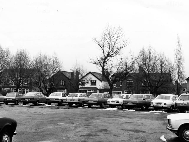 Old Lane in Beeston, looking from a car park towards housing across the road in February 1980.