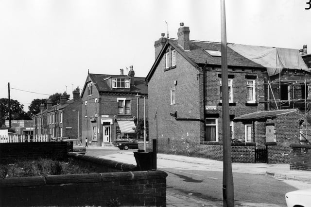 Bude Road in August 1983 looking across to Back Stratford Terrace, then Stratford Street, where the corner shop can be seen, and behind that Clovelly Terrace. Rowland Road Working Mens' Club is on the left at the far end of Bude Road.