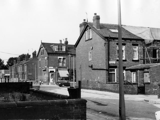 Bude Road in August 1983 looking across to Back Stratford Terrace, then Stratford Street, where the corner shop can be seen, and behind that Clovelly Terrace. Rowland Road Working Mens' Club is on the left at the far end of Bude Road.