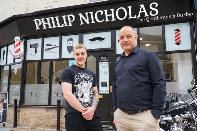 (L to R): Jimmy Wegg, barber and Phil Townend, owner and barber, outside the rebuilt and refurbished Philip Nicholas barber shop in Stanningley
