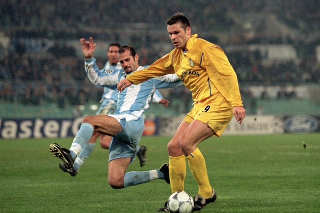 Mark Viduka holds the ball up against Lazio's Giuseppe Pancaro during the Champions League group D clash at the Stadio Olympico in December 2000. Leeds won 1-0.