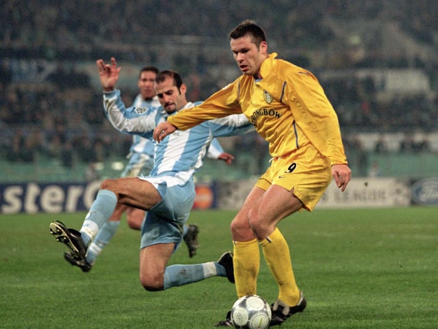 Mark Viduka holds the ball up against Lazio's Giuseppe Pancaro during the Champions League group D clash at the Stadio Olympico in December 2000. Leeds won 1-0.