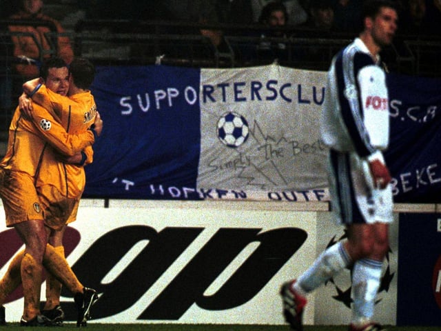 Mark Viduka celebrates scoring with teammate Alan Smith during Leeds United's Champions League Group D clash against Anderlecht at the Stade Vanden Stock in February 2001.