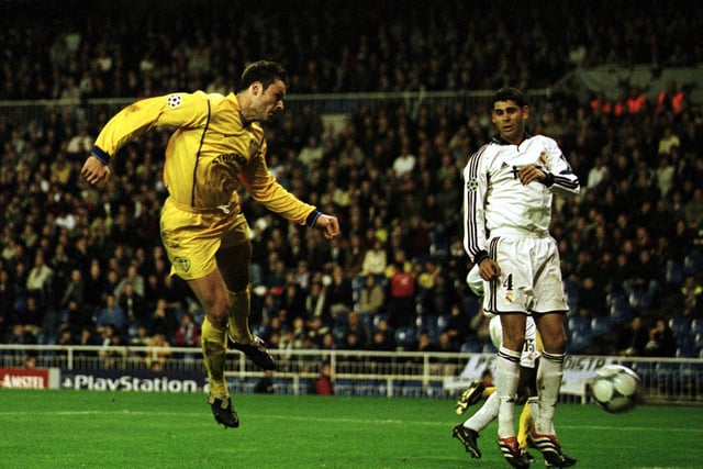 Mark Viduka scores the second goal during Leeds United's Champions League Group D clash against Real Madrid at the Bernabeu Stadium in March 2001.