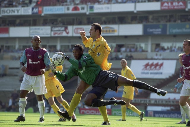 West Ham United goalkeeper Shaka Hislop comes out to claim the ball ahead of Mark Viduka  during the Premiership clash at Upton Park in August 2001.