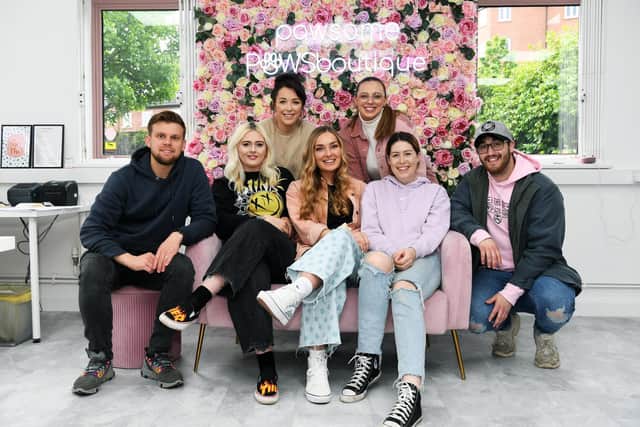 Sophie and Jay with some of their staff. (Pic: Jonathan Gawthorpe)