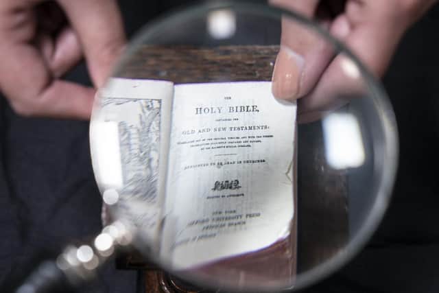 The replica of a so-called Chained Bible contains both testaments printed on 876 gossamer thin India paper pages which can only be read with a magnifying glass. PIC: Danny Lawson/PA