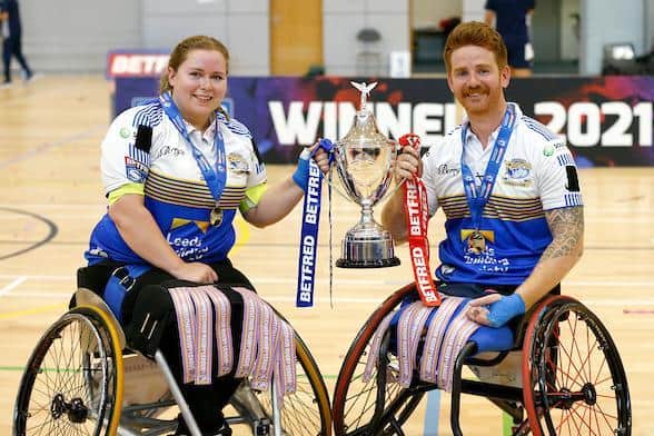 Rhinos' Jodie Boyd-Ward and James Simpson with the Challenge Cup after last year's win over Argonauts Skeleton Army. Picture by Ed Sykes/SWpix.com.