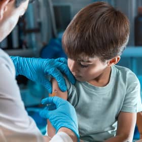 Parents up and down the UK are getting invited to have their primary-age children vaccinated against coronavirus. Picture: Adobe Stock.