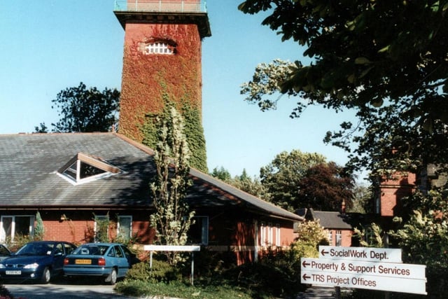 Part of Seacroft Hospital with sign at the entrance with directions to different departments pictured in September 2000.