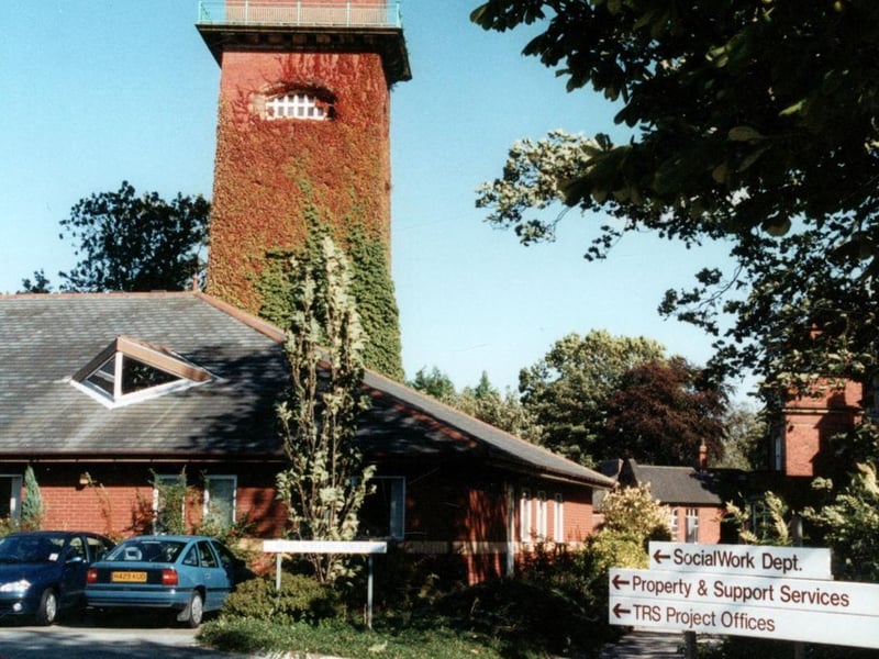 Part of Seacroft Hospital with sign at the entrance with directions to different departments pictured in September 2000.