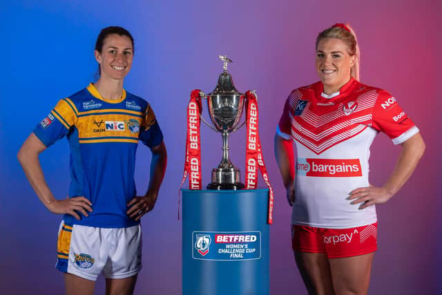 Rhinos captain Courtney Winfield-Hill and Saints skipper Amy Hardcastle with the Betfred Women's Challenge Cup. Picture by RFL.