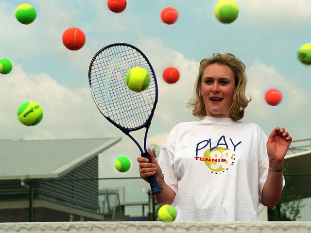 YTV weather girl Debbie Lindley takes evasive action at the launch of Play Tennis 98 at South Leeds Tennis Centre in Middleton.