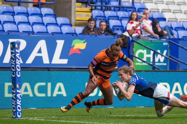 Caitlin Beevers scores for Rhinos against Castleford in the 2019 Challenge Cup final at Bolton. Picture by Isabel Pearce/SWpix.com.