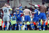SAFE: Leeds United celebrate their brilliant 3-2 success at Arsenal of May 2003 which ensured Premier League survival with a game to go. Picture by Varleys.