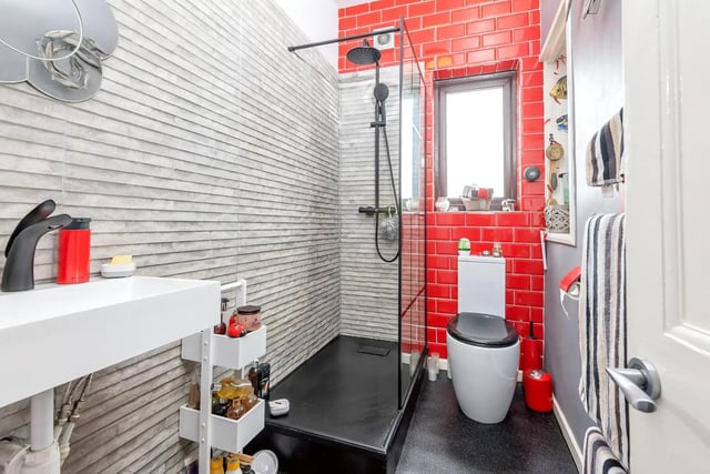 The main bathroom features a delightful walk-in shower.