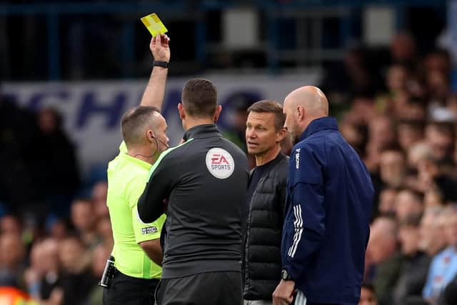 EMOTION: Jesse Marsch is shown a yellow card on the touchline during Leeds' defeat by Manchester City (Photo by Lewis Storey/Getty Images)