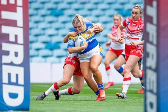 Rhinos' Zoe Hornby powers away to score the opening try. Picture by Allan McKenzie/SWpix.com.
