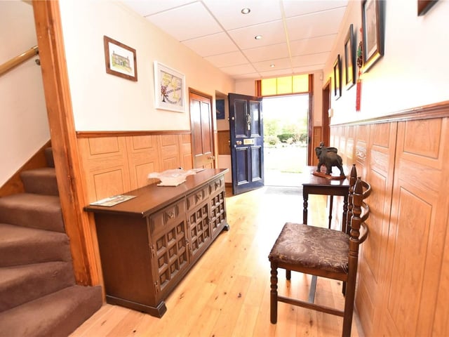 Also on this floor is another reception room, workshop room with W.C and from the kitchen is a secret door with stairs leading down to the basement cellar which will provide useful storage.