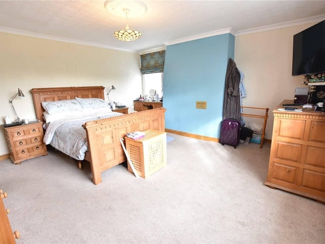 To the first floor, a very spacious landing has a Yorkshire sash window to the front which offers stunning views over the garden and Temple Newsam estate.