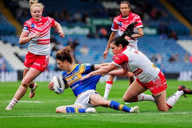 Leeds Rhinos' Courtney Winfield-Hill is tackled by St Helens' Carrie Roberts in Saturday's Challenge Cup final at Elland Road. Picture: Alex Whitehead/SWpix.com.