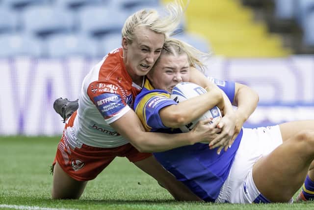 St Helens' Jodie Cunningham is unable to prevent Leeds Rhinos' Zoe Hornby from scoring a try in Saturday's Challenge Cup final. Picture: Allan McKenzie/SWpix.com.