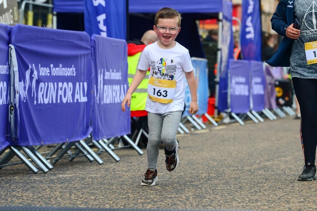 This little man certainly enjoyed the race with his big beaming smile!