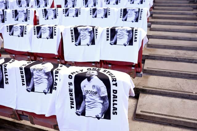 Leeds United pay homage to Stuart Dallas with t-shirts at the Emirates. Pic: Ryan Pierse.